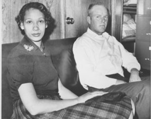 Richard P. Loving, and his wife Mildred, shown in this January 26, 1965 photograph, will file a suit at Federal Court in Richmond, Va., asking for permission to live as husband and wife in Virginia. Both are from Carolin County, south of Fredericksburg, Va., and were married in Washington in 1958. Upon their return the interracial couple was convicted under the state's miscegenation law that bans mixed marriages. They received a suspended sentence on the condition they leave the state, but they now want to return to Virginia. (AP Photo)